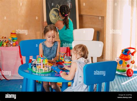 Kids Playing In The Room Development And Social Lerning Childrens