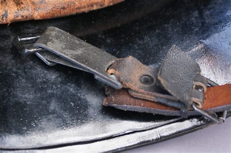 It has four pleated patch pockets with scalloped flaps and belt hooks. Himmler Helmet Thread - Page 5