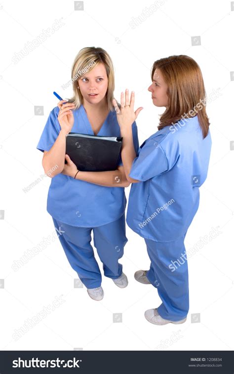 Two Nurses Talking About Doctor Stock Photo 1208834 Shutterstock