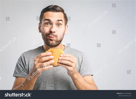 Man Eating A Sandwich Over 28174 Royalty Free Licensable Stock Photos