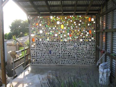 They usually consist of a plastic or glass bottle with a narrow neck and a small opening. Pretty bottle wall - maybe you could use glass nuggets in ...