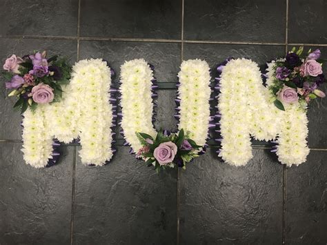 Larger sprays can cost considerably more, especially if they contain more expensive flowers. Mum funeral flowers wetter tribute, white based with lilac ...