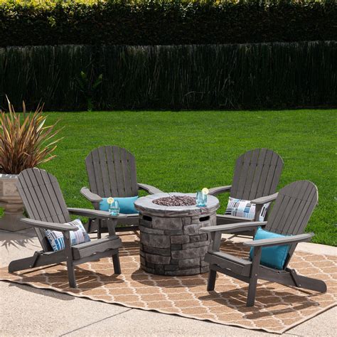 Every pit should have the best fire pit chairs to help your guests enjoy their visit. Royalty Outdoor 5 Piece Acacia Wood Adirondack Chair Set ...