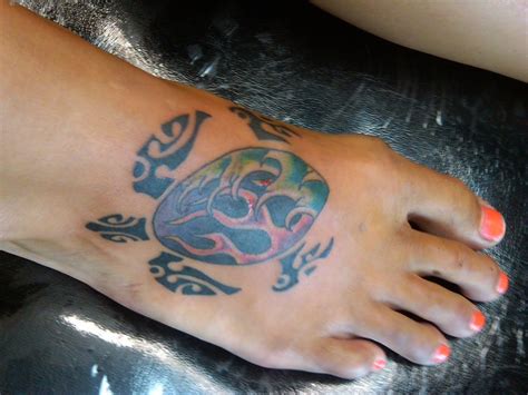 Tattoos in the pattern of jewelry on wrist will give a smart trendy look to girls. 2011 Turtle Tattoo Designs For Women Foot Pattern Picture ...
