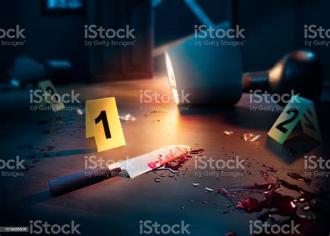 Bloody Crime Scene With Knife And Evidence Markers Stock Photo