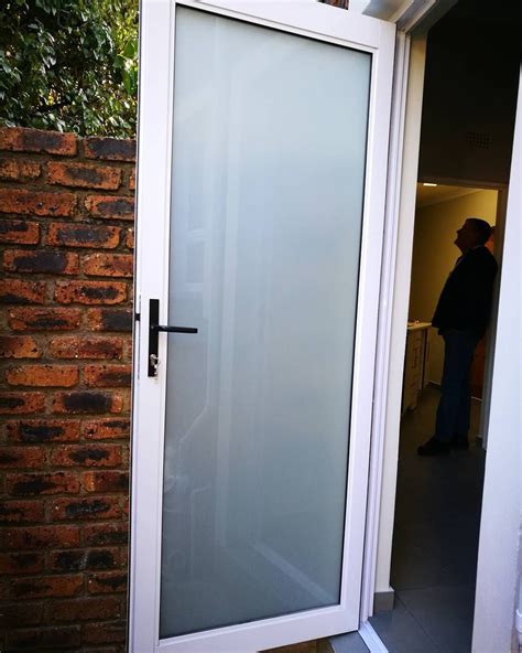 Clean Brilliant Single Hinged White Aluminium Door Supplied By