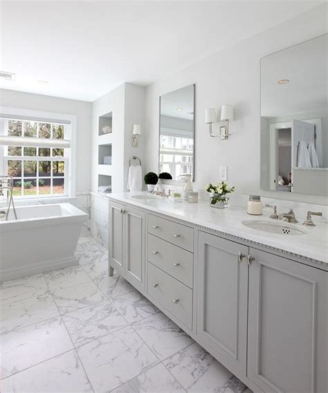 The Blending Of The White And Soft Gray Colors Throughout This Spacious