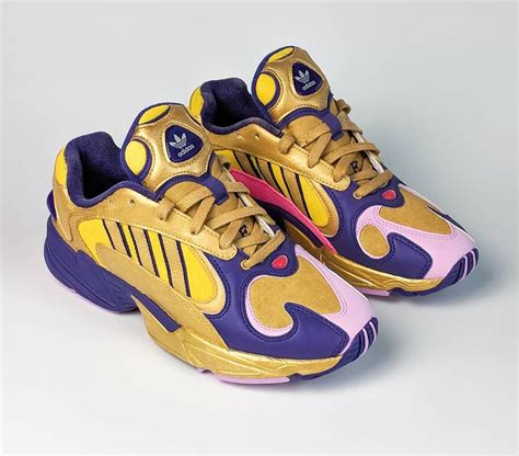 Resembling the character frieza, this pair features white mesh and leather across the upper while both purple and pink accents are used. Adidas Falcon Yung-1 DBZ Golden Freezer