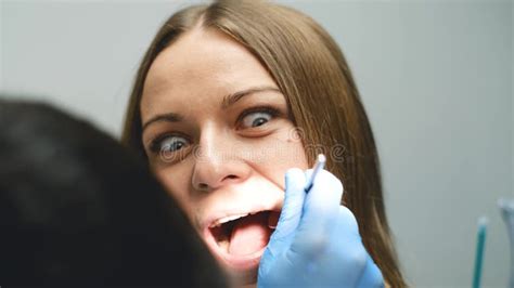 Scared Girl Treats Teeth In A Modern Clinic Cowardice And Fear Of The