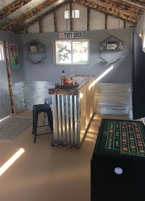 a man cave can be as simple or as decked out as you d like this rustic welcoming man cave shed