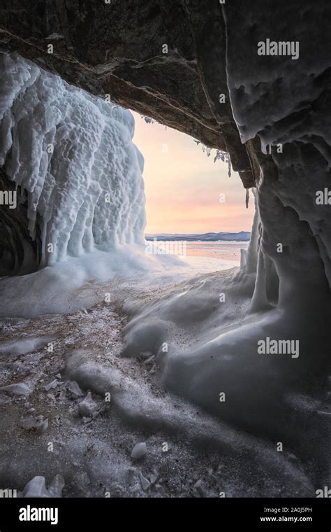 Ice Cave At Sunset In Baikal Lake Stock Photo Alamy