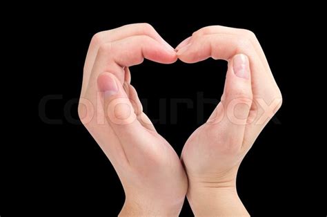 Two Hands Form A Heart Shape Stock Photo Colourbox