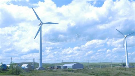Wind Turbines Farm Aerogenerator Windmill In Sunny Blue Sky Day Wind