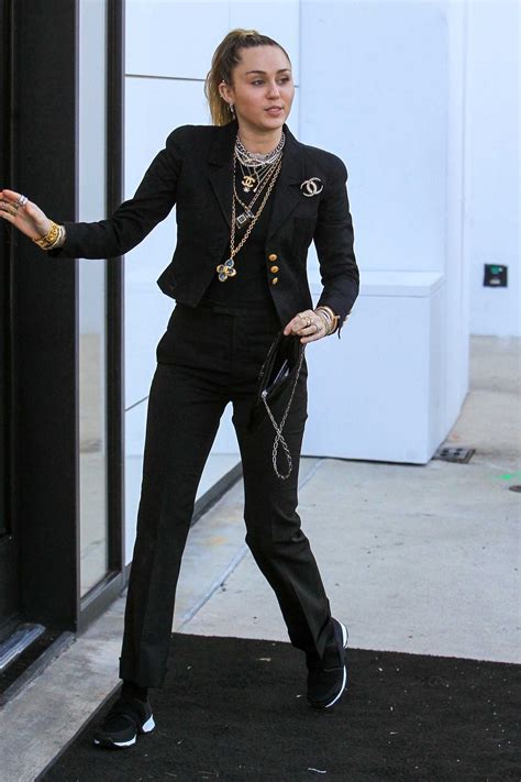 Miley Cyrus In A Black Sneakers Arrives At The Chanel Store In La