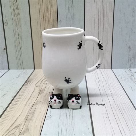 If you are not sure where to start, these cute gifts for cat lovers on this list are sure to keep your gifts for cat lovers. Cat Slipper Mug, Cat mug Pottery, Walking Pottery, Unique ...