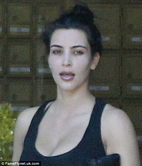 kim kardashian slicks on the lipstick as she hits the gym daily mail online