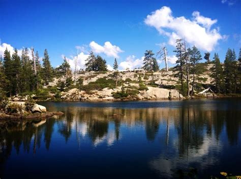 An Isolated Mountain Lake Located High Up In The Sierras In Northern