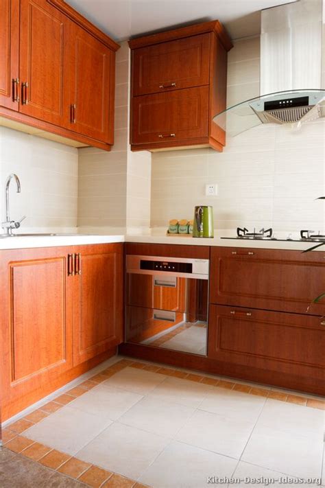 Cherry kitchen cabinet is also recommended for those whom wanted to bring natural tones to their kitchen. Pictures of Kitchens - Traditional - Medium Wood Kitchens ...