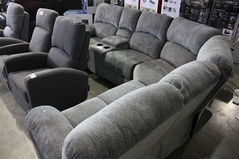 Grey Curved Sectional Sofa With Console And Cup Holders