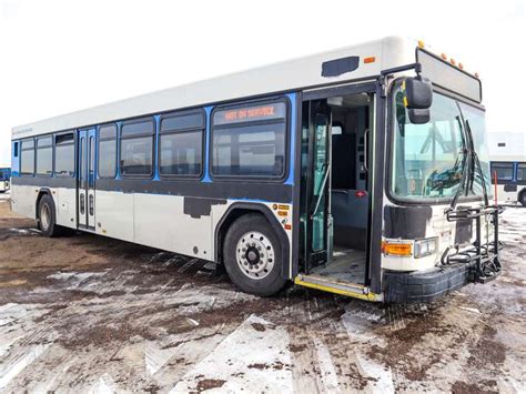 With the front arms shorter than the rear arms. 2005 Gillig Low Floor 2WD Bus - Roller Auction