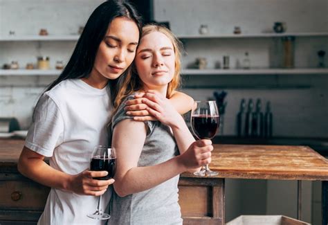 free photo lesbian couple drinking wine