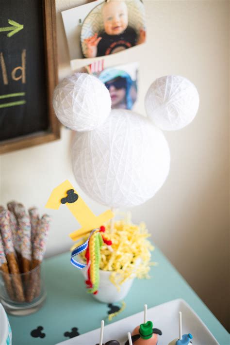Decorate every table at your mickey mouse birthday party with a super mickey mouse centerpiece! Kara's Party Ideas Styrofoam Ball Mickey Mouse Centerpiece from a Mickey Mouse DIY Birthday ...