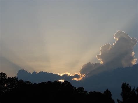 Sun Setting Behind Storm Clouds Jasen J1 Flickr
