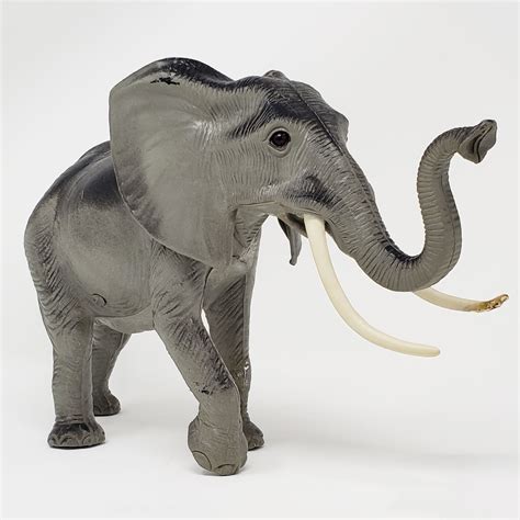 Vintage Hard Plastic Elephant Toy Long Tusks 12 Inches X 7 Inches
