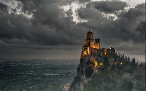 Towers Of San Marino Under Dark Clouds Hd Wallpaper Background Image