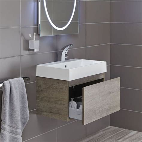 Choose from semi or fully recessed basins, to an above counter basin if you are wanting to achieve a modern look in your bathroom. Mino 600mm Basin & Wall Mounted Vanity Unit - Nebraska Oak ...