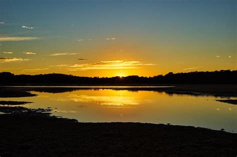 Yellow Sunset Over A Quiet Lake Free Image Download