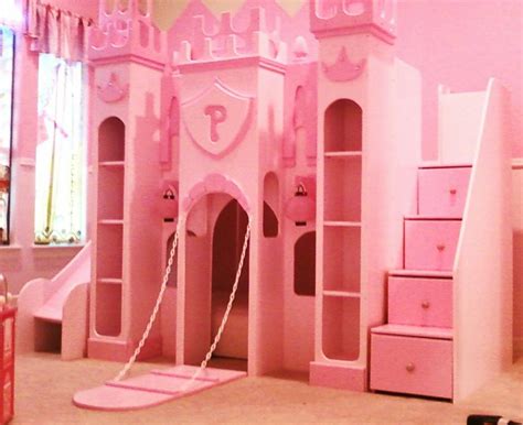 The princess castle tent bunk bed with slide includes a tent over twin bed and a covered hiding place below. Pictures for Neverland Theme Beds in Abilene, TX 79606