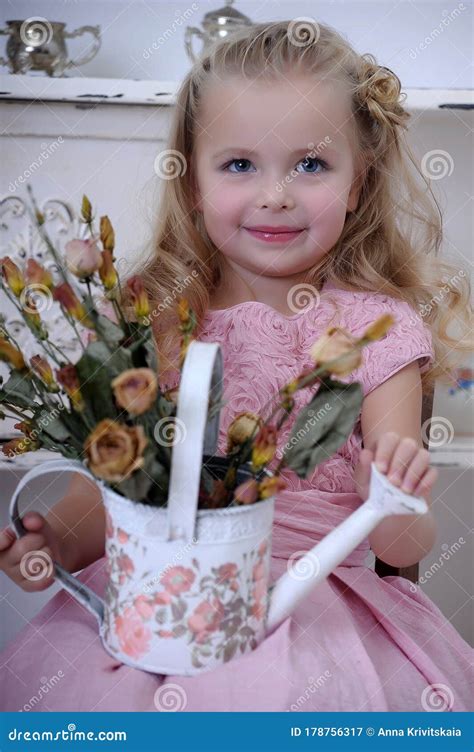 Cute Little Blonde Girl In A Pink Dress With Curls Stock Image Image Of Blonde Happiness