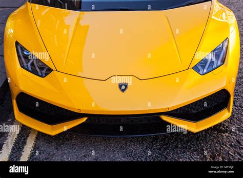 A Yellow Lamborghini Sports Car In A Uk Street Stock Photo Alamy