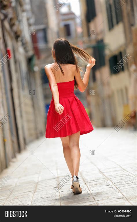 Woman Red Dress Walking Street Image And Photo Bigstock
