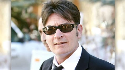 report charlie sheen backs out of lawsuit entertainment tonight
