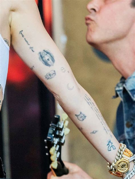 Miley Cyrus Tattoos Guide To All Her Ink And Their Meanings