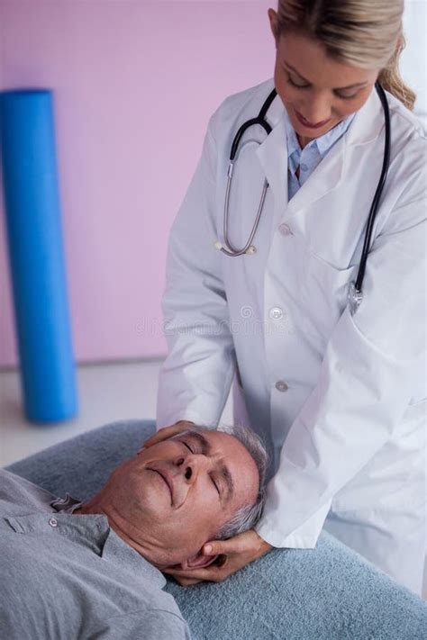 Senior Man Receiving Neck Massage From Physiotherapist Stock Image Image Of Cure Female 76019953