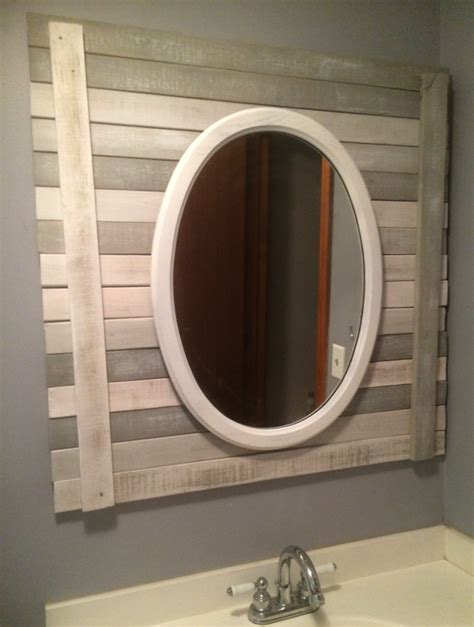 Elevate a simple wall cabinet into something amazing by swapping traditional doors for rolling round mirrors. Farmhouse Bathroom Mirror | Farmhouse bathroom mirrors ...