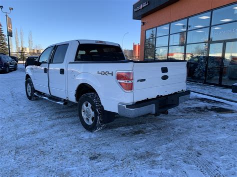Pre Owned 2009 Ford F 150 4wd Crew Pick Up 145 Xlt Truck In Calgary Ps