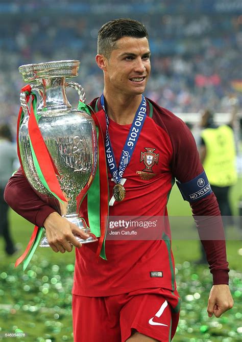 Cristiano Ronaldo Of Portugal Holds The Trophy Following The Uefa