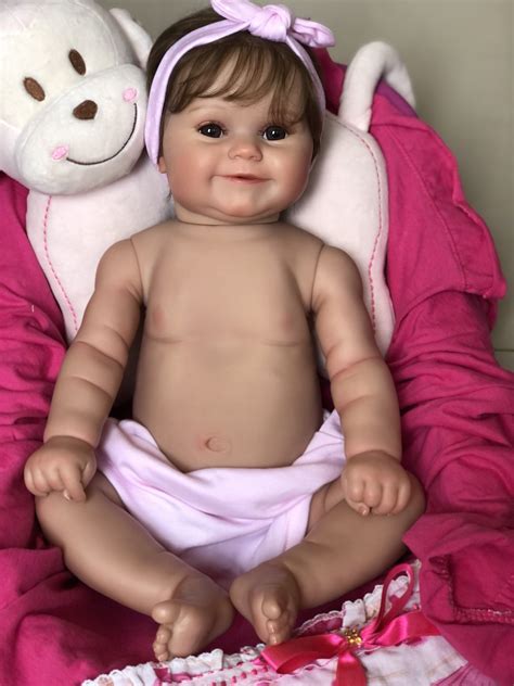 bebê reborn realista maddie corpo todo silicone cabelo implantado fio a fio pode dar banho