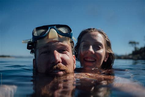 Couple Having Fun In Water Del Colaborador De Stocksy Boris Jovanovic Stocksy