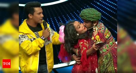 Indian Idol 11 Contestant Forcibly Plants A Kiss On Neha Kakkars Cheek Leaving Her Shocked