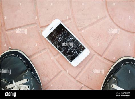 Cellphone Smartphone Drop On Ground Hi Res Stock Photography And Images