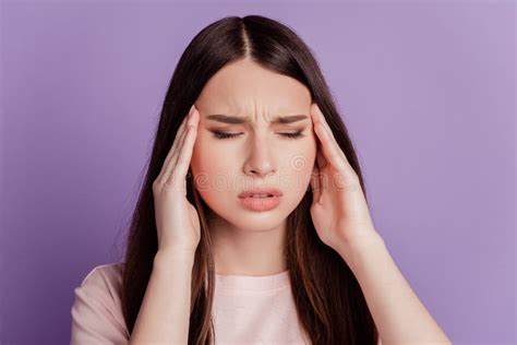 Portrait Of Sad Troubled Tired Woman Have Headache Suffer On Purple Background Stock Image