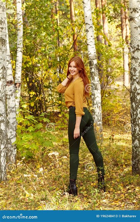 Portrait Of A Beautiful Redhead Woman In Autumn Forest Stock Image Image Of Autumn Yellow