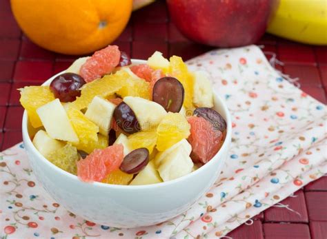 Fruit Salad From Banana Orange Grapes And Apples Royalty Free Stock