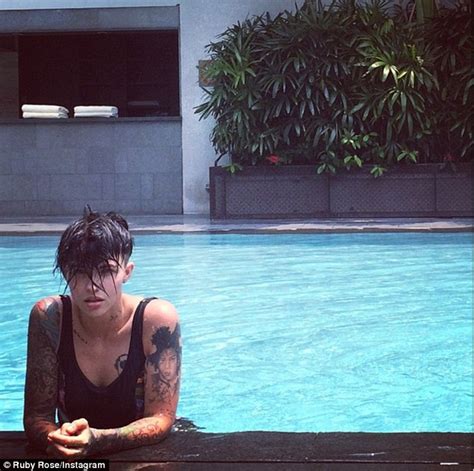 Ruby Rose Strips Down To Black Swimsuit For Water Antics In Singapore