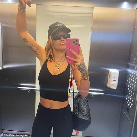 Rita Ora Shows Off Taut Midriff In Black Crop Top In Series Of Instagram Photos Daily Mail Online